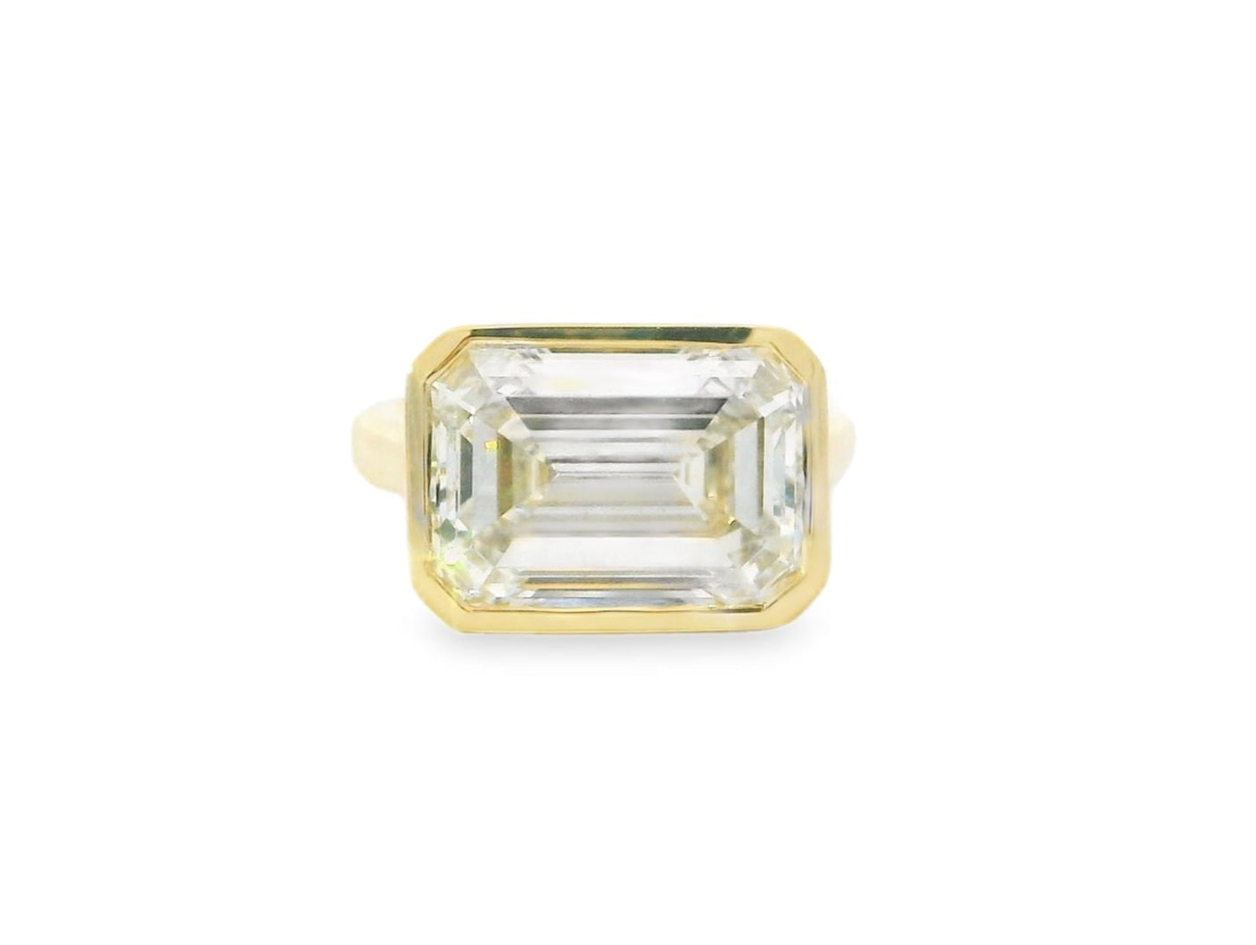 8 Carat East to West Bezel Set Emerald Cut Engagement Ring