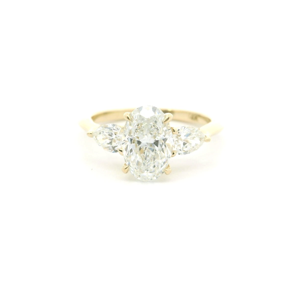2 Carat Oval Cut with Pear Sidestones Engagement Ring